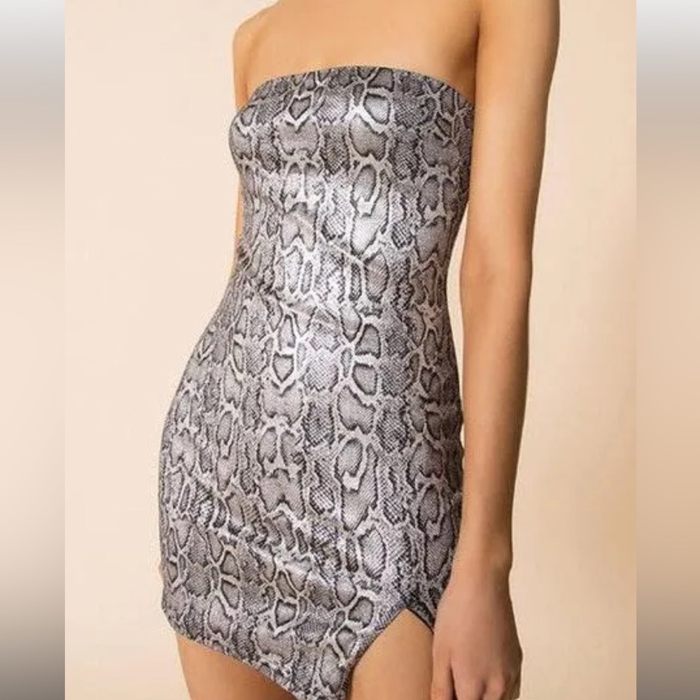 Metallic super down snake skin mini body con dress. Worn once. Great condition.